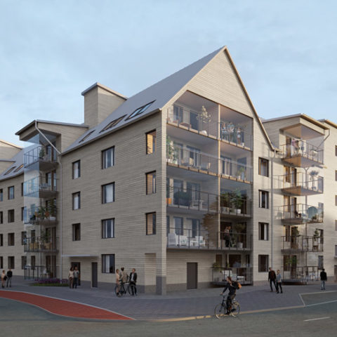 Ett grått bostadshus i trä