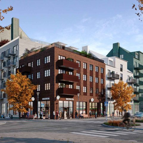 En vy över några stora hyreshusfasader. En vinröd, två vita och tre gråa fasader där man ser balkonger på.