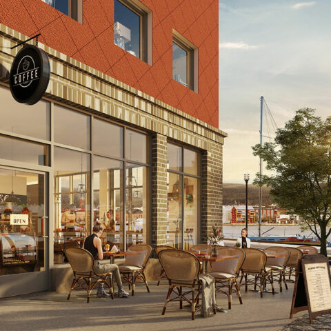 Fasad från röda huset i lastkajen, med hur ett café ser ut.