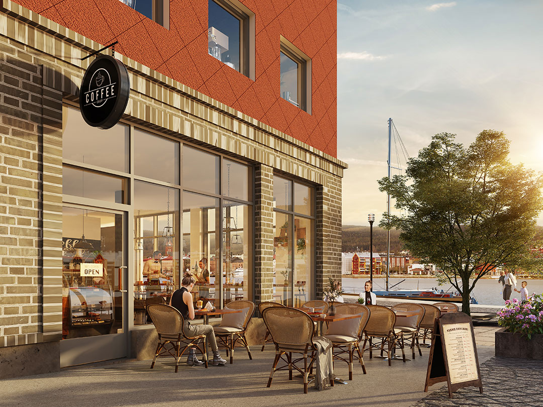 Fasad från röda huset i lastkajen, med hur ett café ser ut.