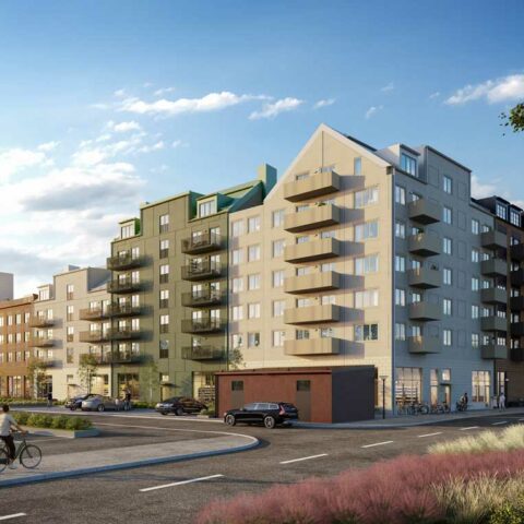 Husfasad i vitt och grönt