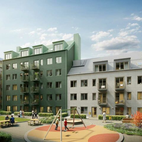 en grön och en vit bostadshusfasad