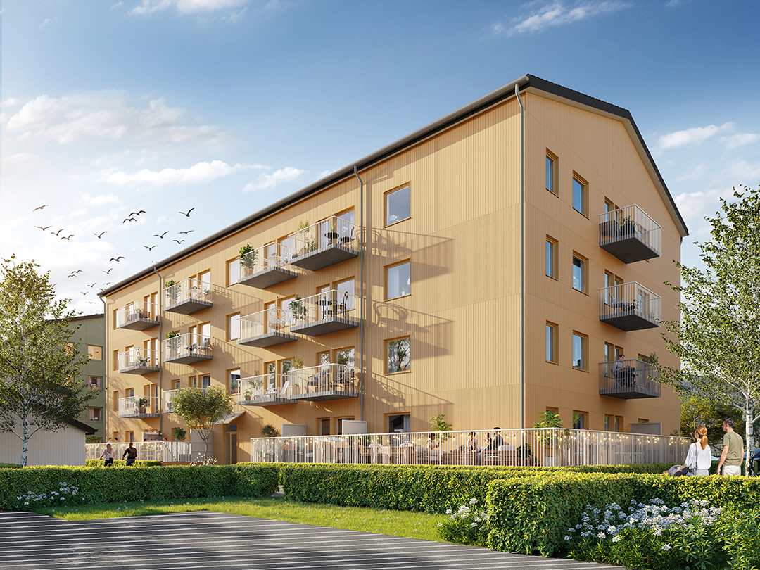 Flerfamiljshus med träfasad i okra gult och uteplatser i Erisklis Skellefteå