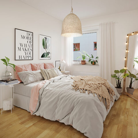 Sovrum med parkettgolv och fönster