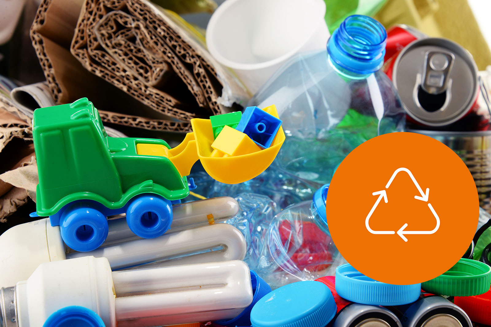 A mix of different things in a pile that is going to be recycled.