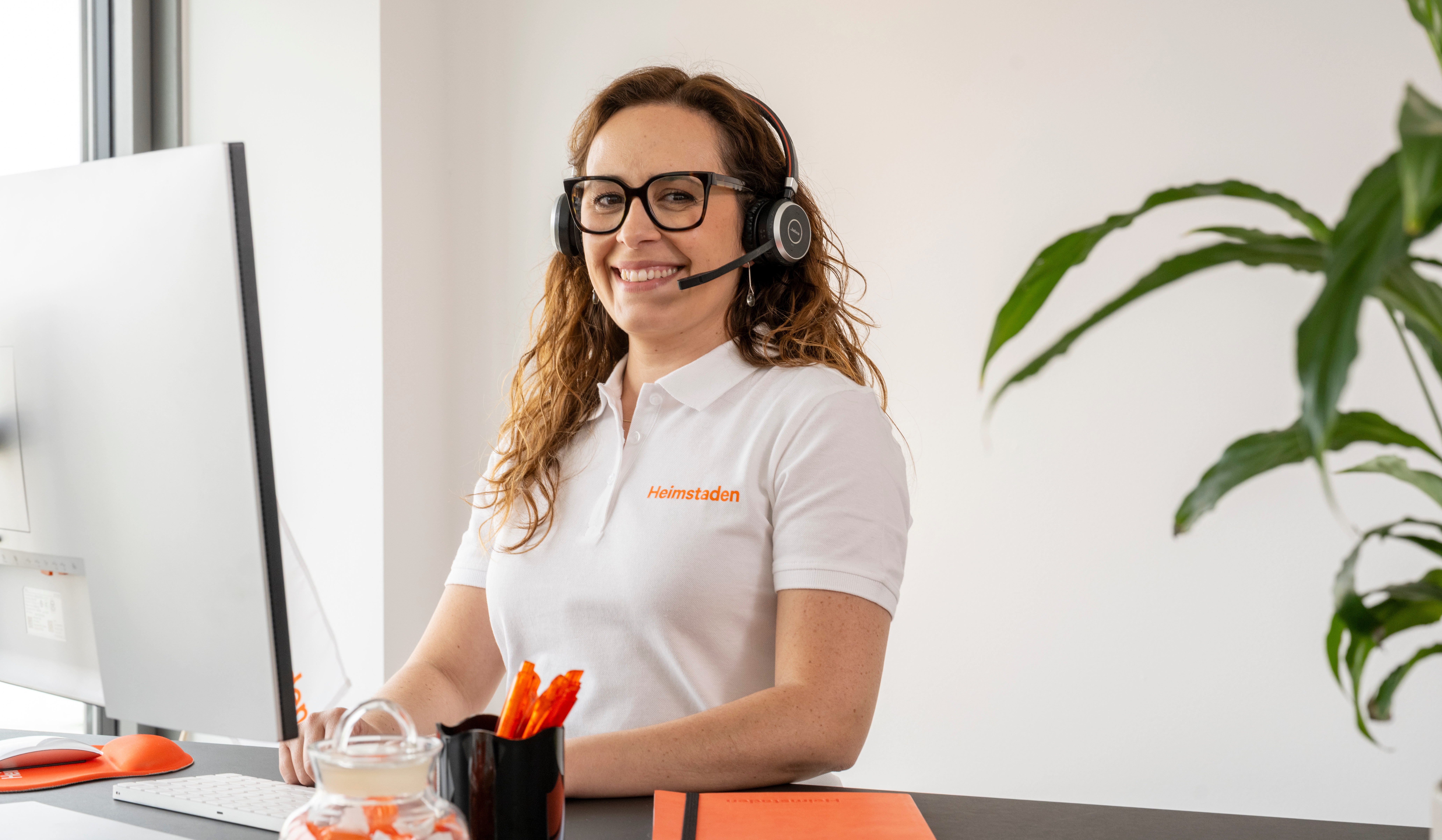 Customer Care agent at desk