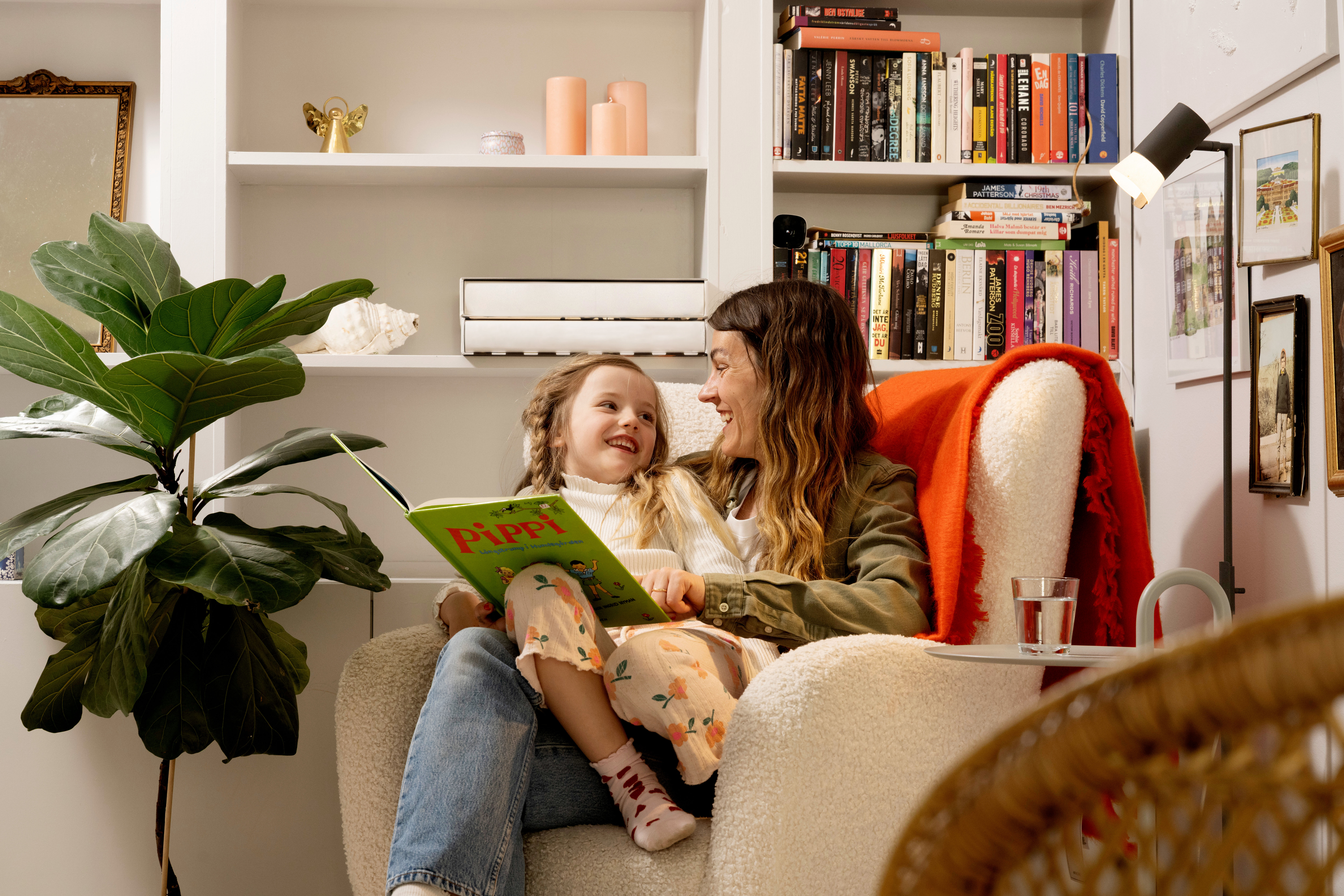 Mother reading a book to child